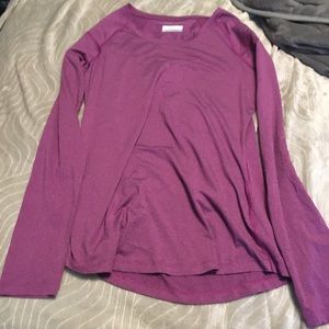Woman’s purple Columbia shirt